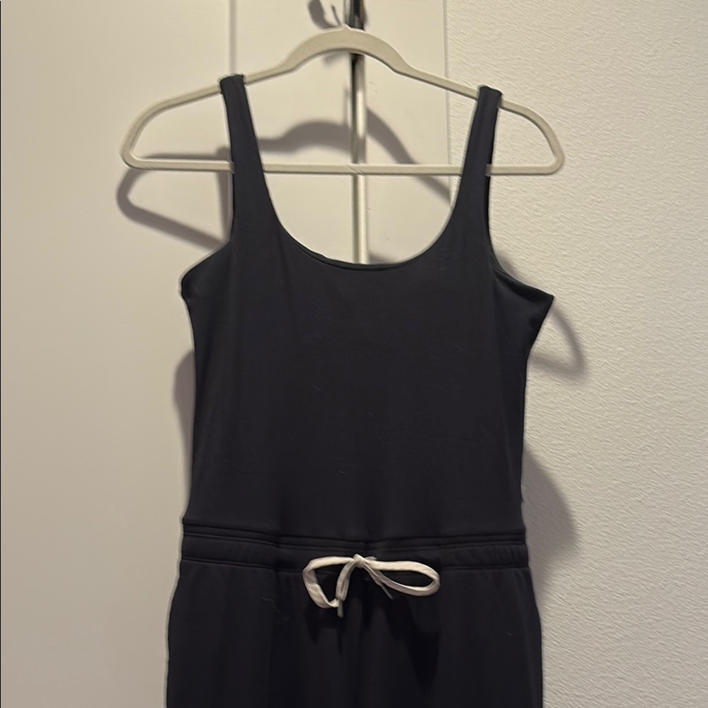 Black Sleeveless Jumpsuit with White Drawstring